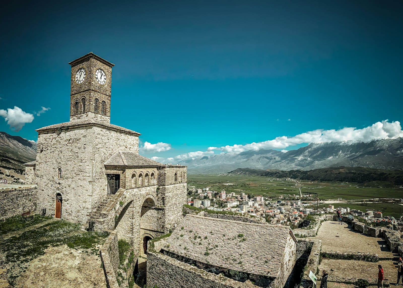 Clock tower and stone buildings in Gjirokastër