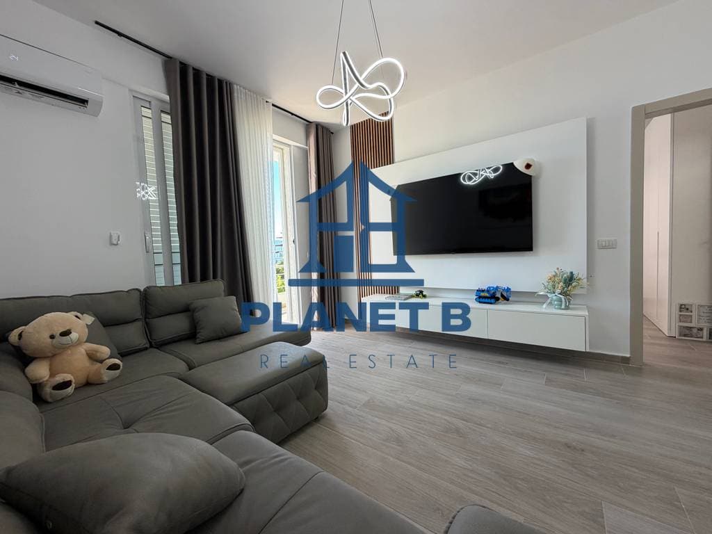 Living room of the brand-new seafront 1BR on Old Beach, Vlorë