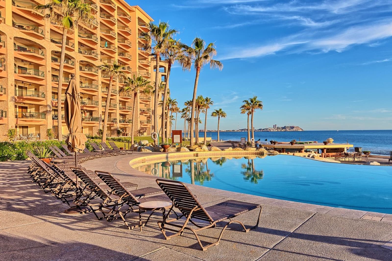 Sunny pool deck at Sonoran Sea looking out to the Sea of Cortez