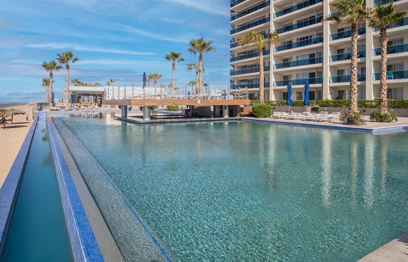 Encantame Towers infinity pool and high-rise on Playa Encanto