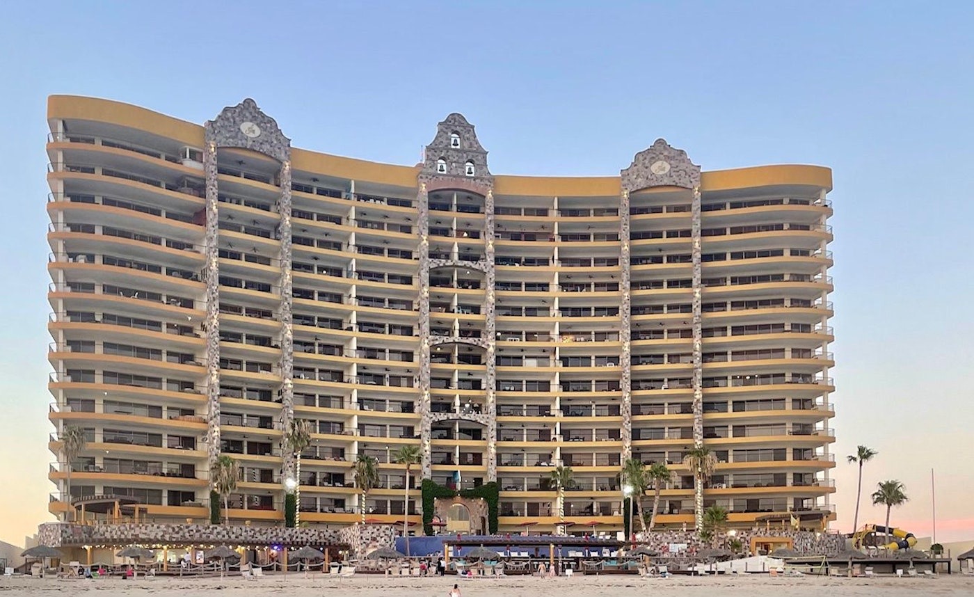 Sonoran Sky’s oceanfront tower on Sandy Beach at sunset